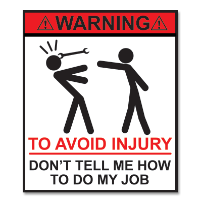 "WARNING don't tell me how to do my job" sticker.
